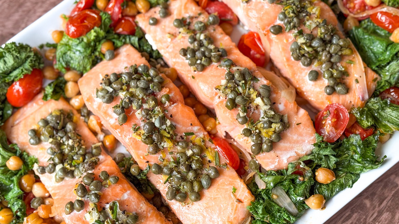 1-pan baked salmon with mustard greens and chickpeas on serving platter