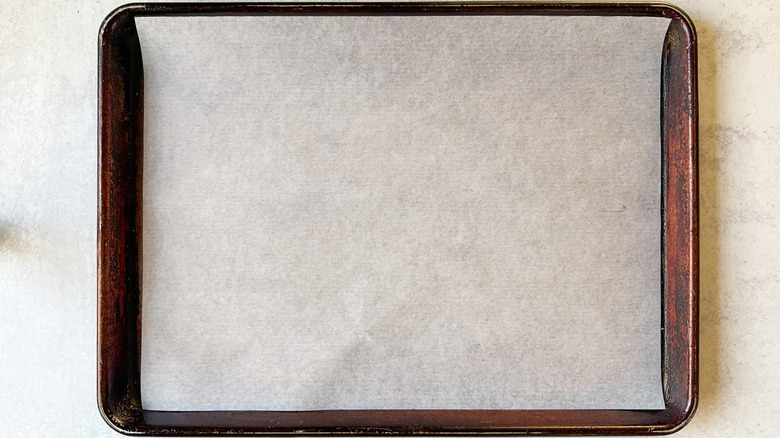 Baking sheet lined with parchment paper