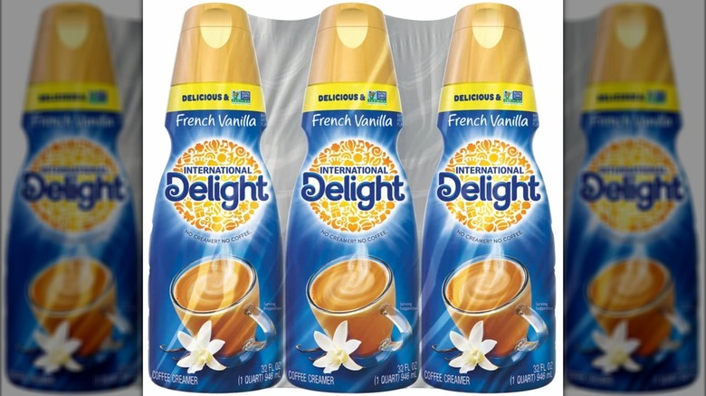 A package of three International Delight coffee creamer