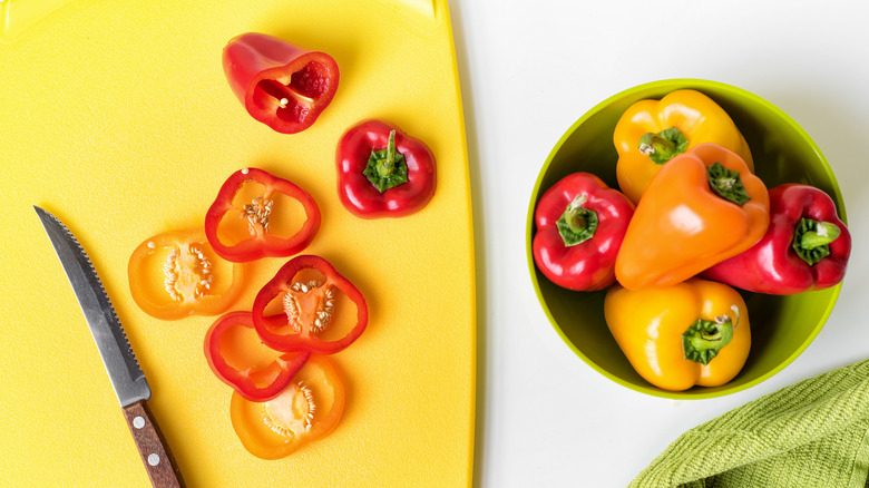 Cut bell peppers on cutting board