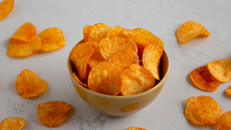 Bowl of orange spicy potato chips