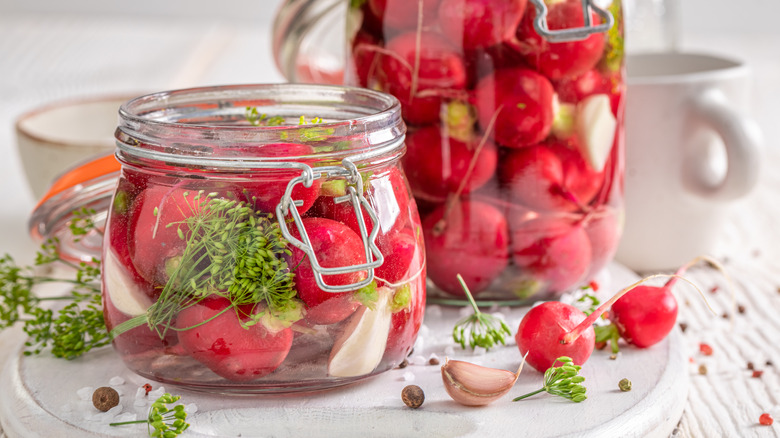 Pickled radishes in jars