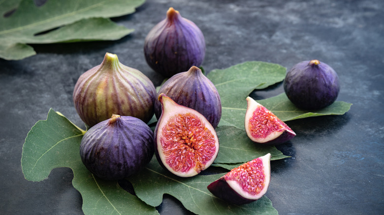 Fresh figs on dark background