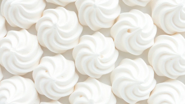 Meringue cookies closely stacked together