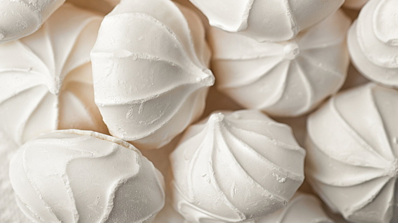 Closeup of meringue cookies stacked on top of each other