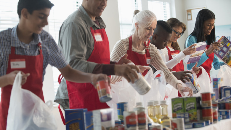 charity workers packing food items