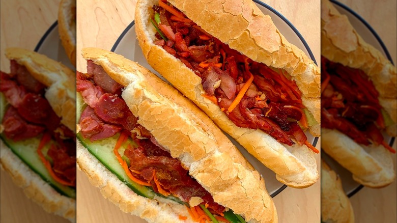 two Vietnamese style sandwiches on a plate