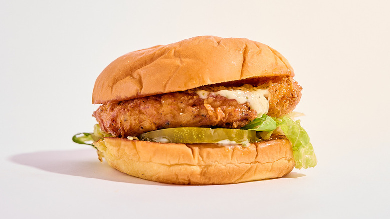 A Shake Shack chicken sandwich on table