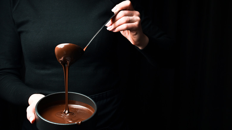 Ladle with melted chocolate