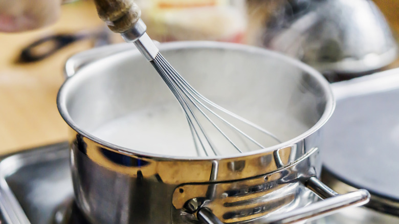 Milk simmering on a stove