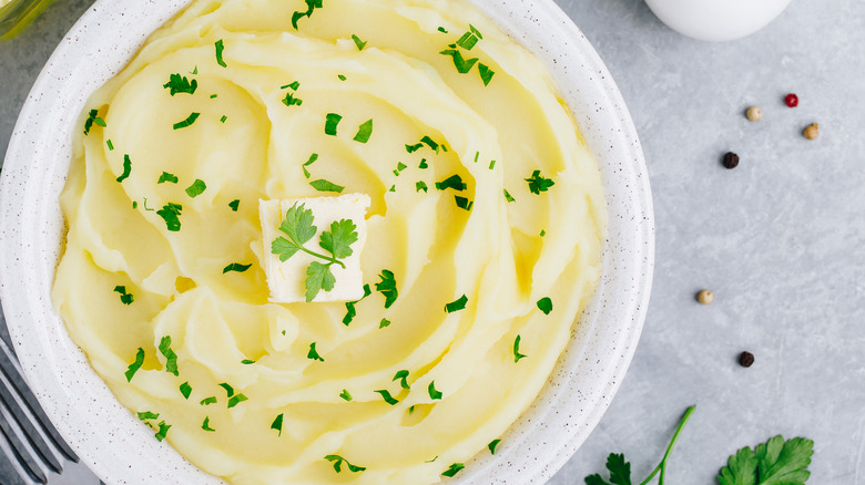 Mashed potatoes topped with herbs