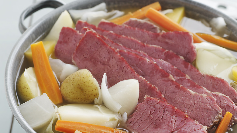 Corned beef in boiling pot