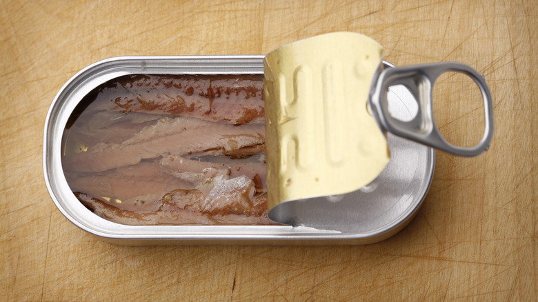 canned anchovies, open can