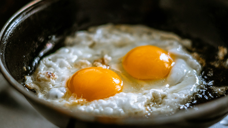 Eggs frying in skillet