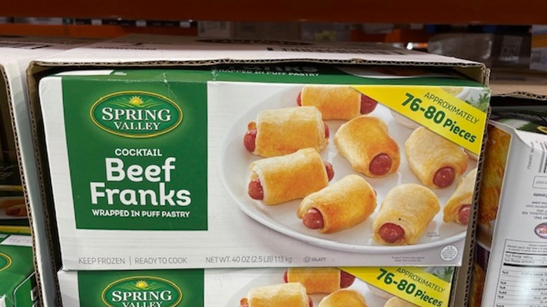 A box of cocktail beef franks in the display box on the shelf at Costco