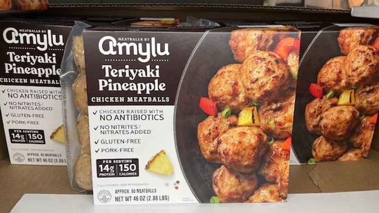 A package of Amylu teriyaki pineapple chicken meatballs in the store display case