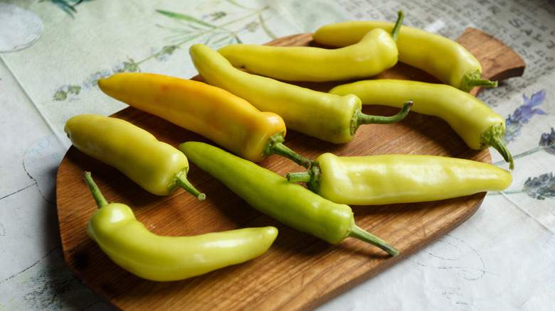 Yellow chiles on cutting board