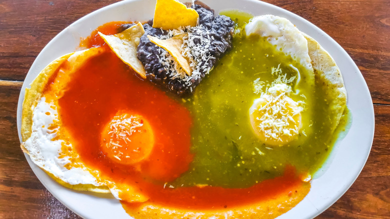 Huevos divorciados on white plate