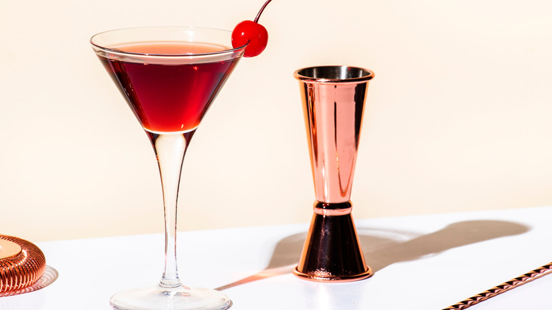 Cherry martini with a jigger