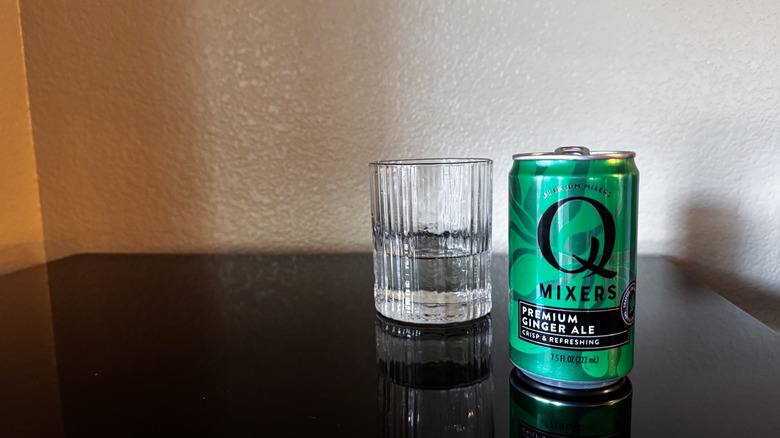 Q Mixers Ginger Ale with a glass of ginger ale can next to it