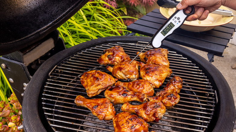 Chicken tested with meat thermometer