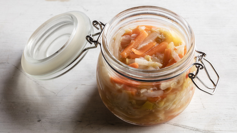 Open jar of kimchi