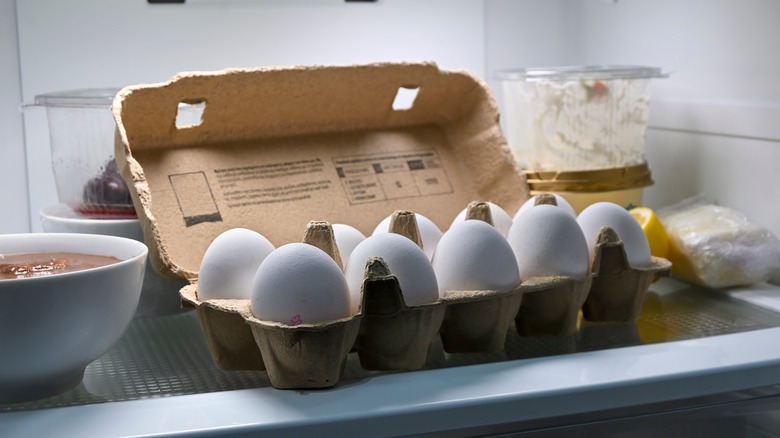 Carton of eggs in fridge