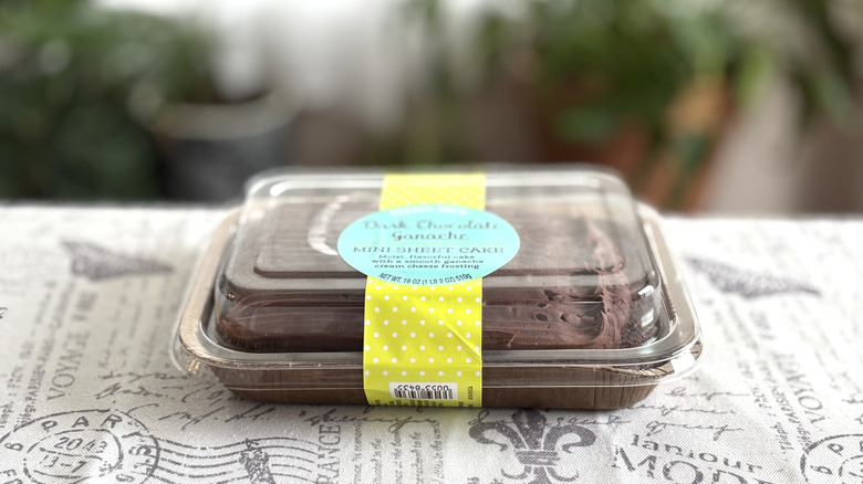 A packaged Trader Joe's Dark Chocolate Ganache Sheet Cake