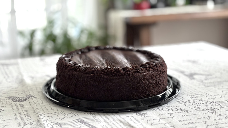 A whole Costco Chocolate Cake on a table