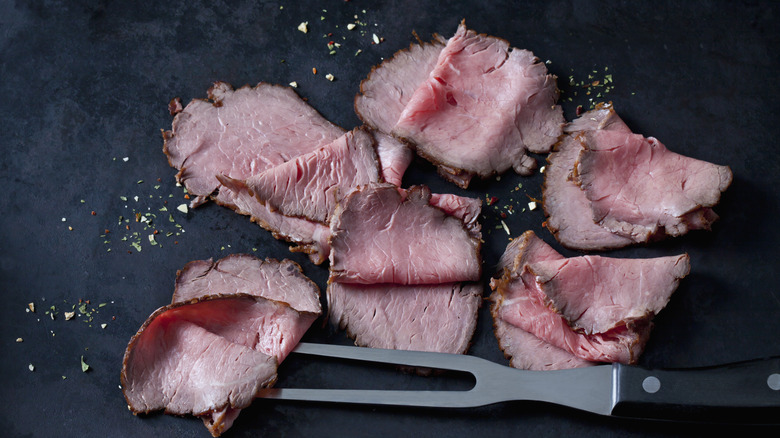 A close-up of roast beef slices