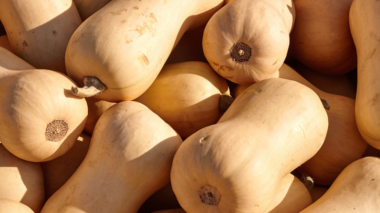 butternut squash piled together with shadows