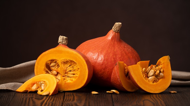 Hokkaido pumpkins against black backdrop