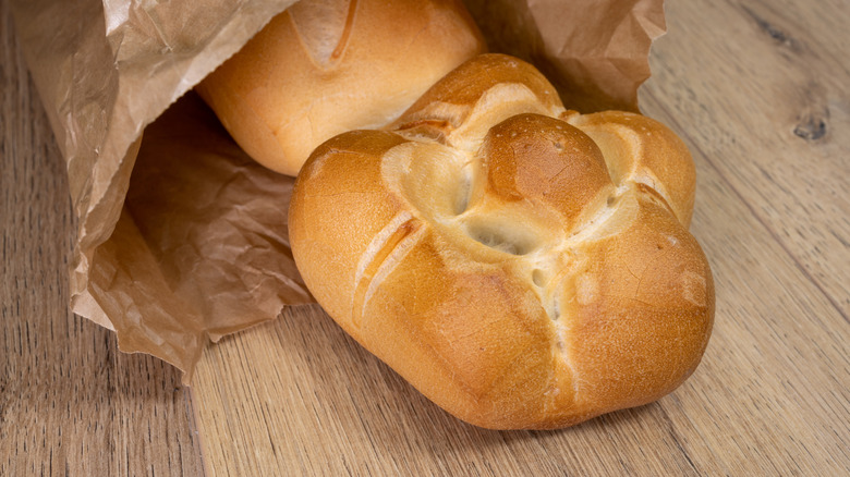 Italian Michetta bread rolls in bag