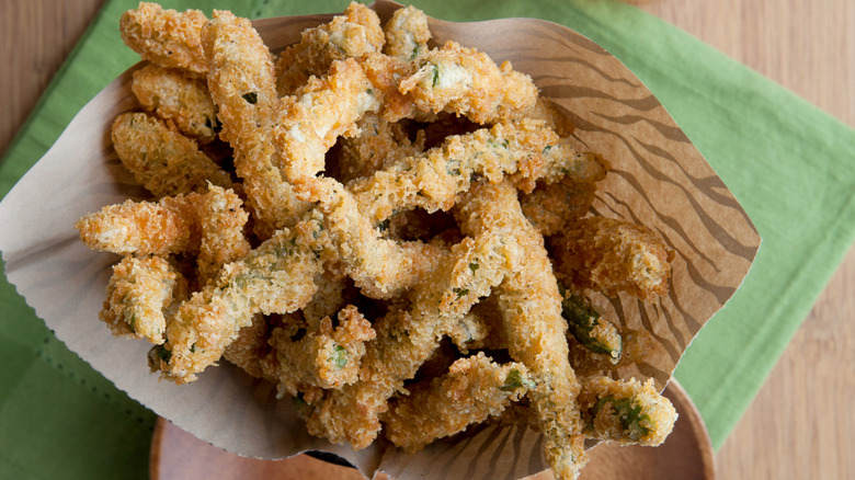 fried green beans in paper