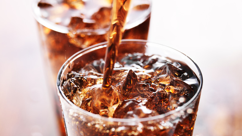 close up of the top of a glass of bubbly soda
