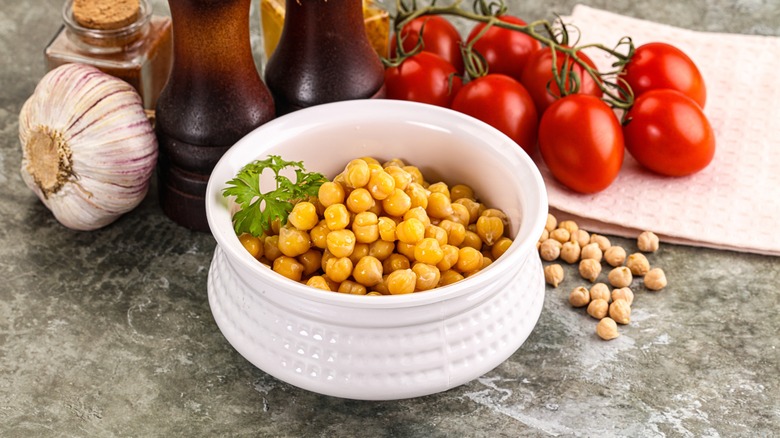 Canned chickpeas in white bowl