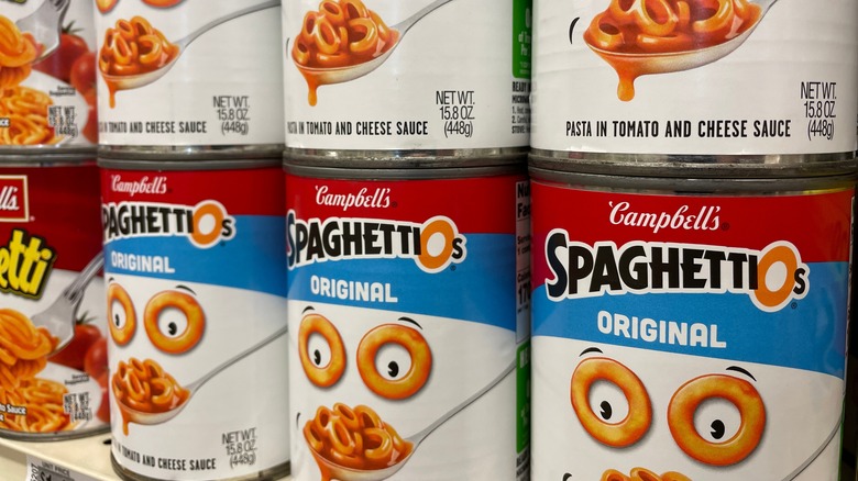 stacked cans of Campbell's Spaghettios