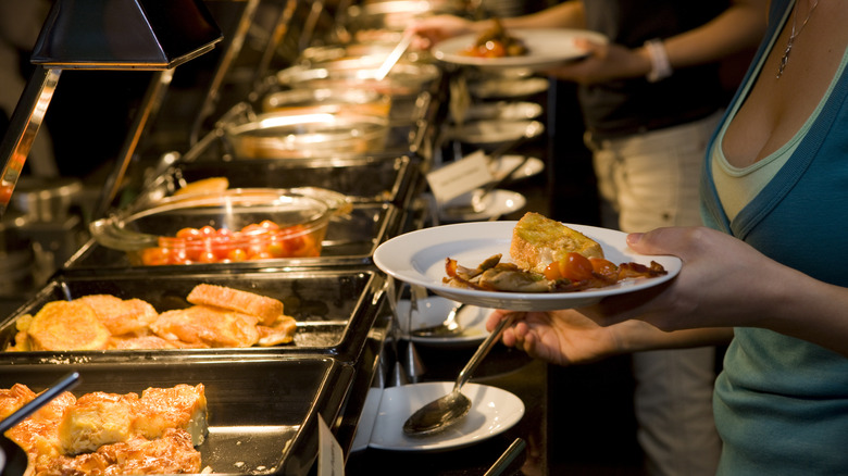 Customers at a buffet restaurant