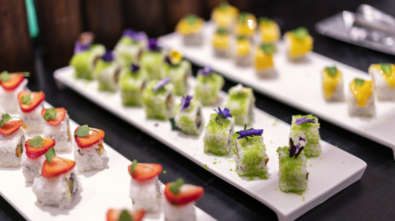 A selection of sushi at a buffet