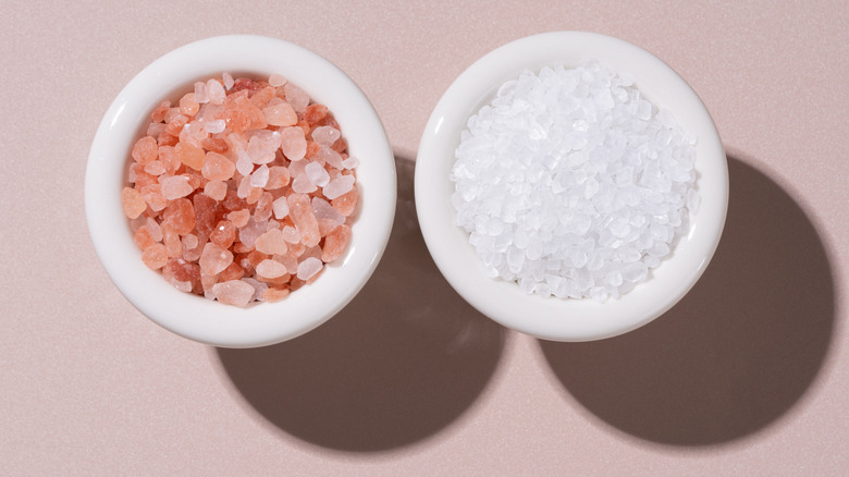 Himalayan and white sea salt in white ramekins