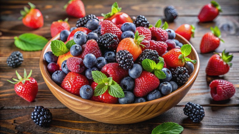 wooden bowl filled with fresh berries