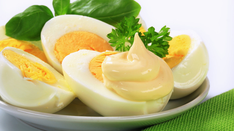Hardboiled eggs with mayo on one