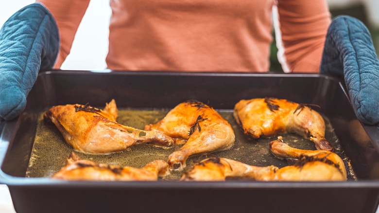 Chicken legs in baking tray