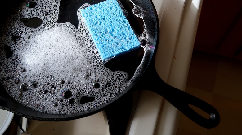 Skillet with soap and sponge