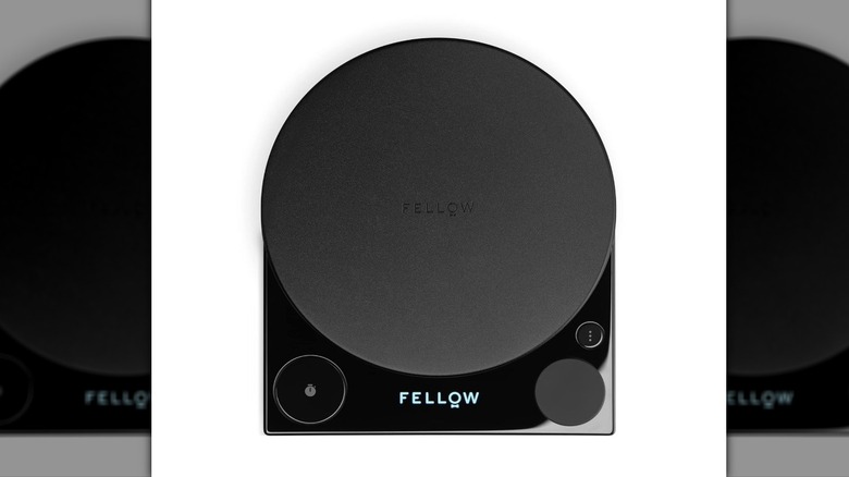 A black Fellow Tally Pro Precision scale