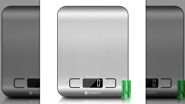 A digital scale with two batteries