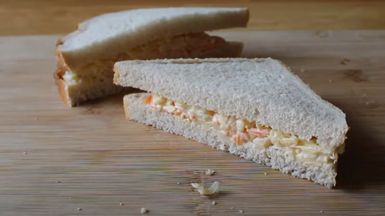 Coleslaw with Swiss cheese sandwich