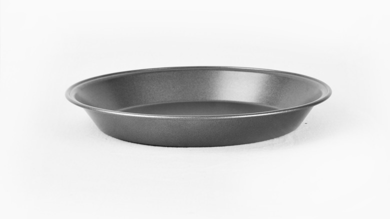 black pie pan white background