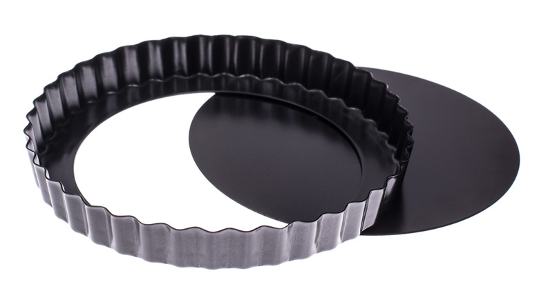 black tart pan white background