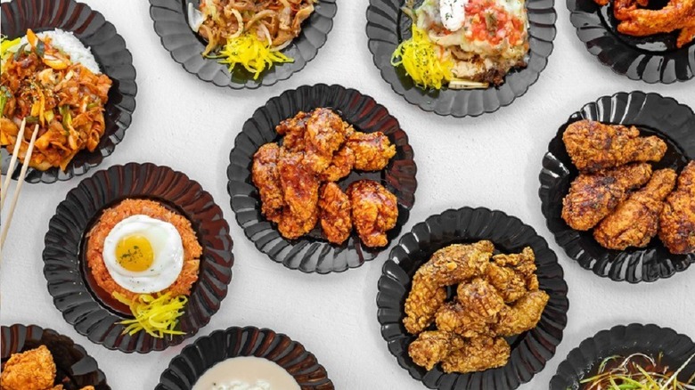 a spread of fried chicken and Korean dishes at 92 Chicken